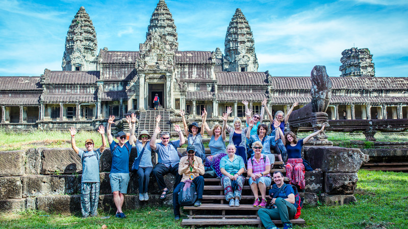 Tourists enjoy the beauty of Angkor Wat